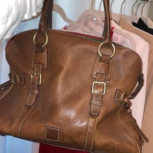 Dooney & Bourke Brown leather Hand Bag with Red fabric lining and key chain clip